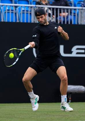24th June 2025; Devonshire Park, Eastbourne, East Sussex, England; Lexus International Eastbourne, Day 2; Jacob Fearnley (GBR) plays a forehand shot against Flavio Cobolli (ITA)  ActionPlus12805320 HongboxChen