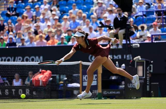 25th June 2025; Devonshire Park, Eastbourne, East Sussex, England; Lexus International Eastbourne, Day 3; Emma Raducanu (GBR) plays a backhand shot against Maya Joint (AUS)  ActionPlus12805403 HongboxChen
