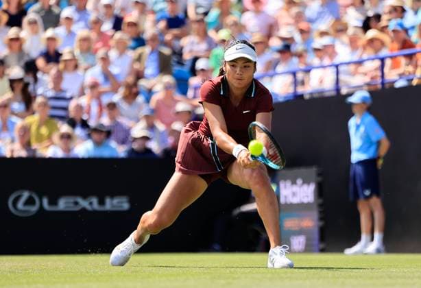 25th June 2025; Devonshire Park, Eastbourne, East Sussex, England; Lexus International Eastbourne, Day 3; Emma Raducanu (GBR) plays a backhand shot against Maya Joint (AUS)  ActionPlus12805404 HongboxChen