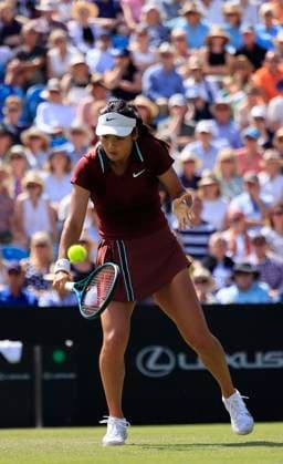 25th June 2025; Devonshire Park, Eastbourne, East Sussex, England; Lexus International Eastbourne, Day 3; Emma Raducanu (GBR) plays a backhand shot against Maya Joint (AUS)  ActionPlus12805405 HongboxChen