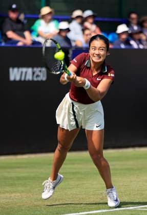 25th June 2025; Devonshire Park, Eastbourne, East Sussex, England; Lexus International Eastbourne, Day 3; Alexandra Eala (PHI) plays a backhand against Jelena Ostapenko (LAT)  ActionPlus12805411 HongboxChen