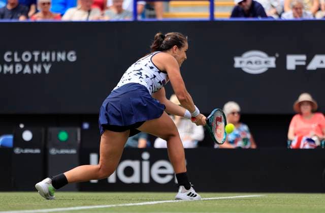 25th June 2025; Devonshire Park, Eastbourne, East Sussex, England; Lexus International Eastbourne, Day 3; Jodie Burrage (GBR) plays a backhand shot against Barbora Krejcikova (CZE)  ActionPlus12805362 HongboxChen