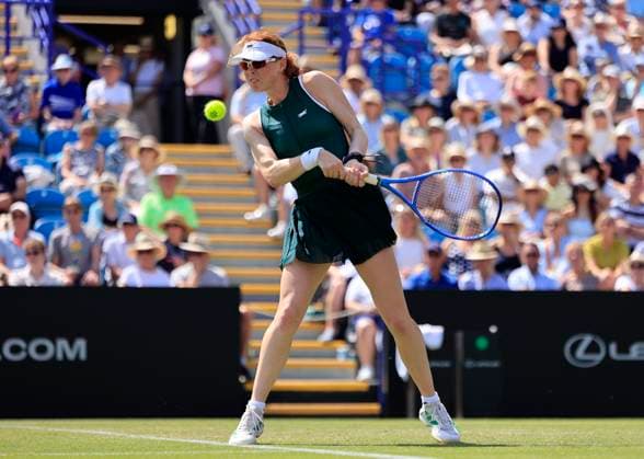 25th June 2025; Devonshire Park, Eastbourne, East Sussex, England; Lexus International Eastbourne, Day 3; Maya Joint (AUS) plays a backhand shot against Emma Raducanu (GBR)  ActionPlus12805393 HongboxChen