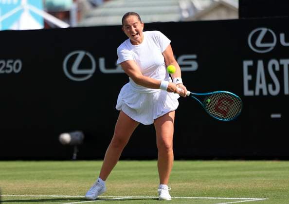 25th June 2025; Devonshire Park, Eastbourne, East Sussex, England; Lexus International Eastbourne, Day 3; Jelena Ostapenko (LAT) plays a backhand against Alexandra Eala (PHI)  ActionPlus12805414 HongboxChen