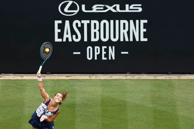25th June 2025; Devonshire Park, Eastbourne, East Sussex, England; Lexus International Eastbourne, Day 3; Jodie Burrage (GBR) serves to Barbora Krejcikova (CZE)  ActionPlus12805432 HongboxChen