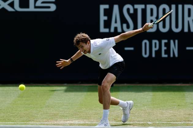 25th June 2025; Devonshire Park, Eastbourne, East Sussex, England; Lexus International Eastbourne, Day 3; Ugo Humbert (FRA) plays a backhand shot against Lorenzo Sonego (ITA)  ActionPlus12805464 HongboxChen