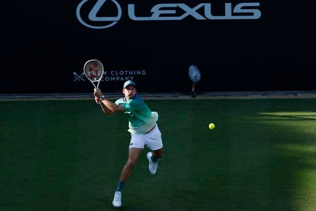 25th June 2025; Devonshire Park, Eastbourne, East Sussex, England; Lexus International Eastbourne, Day 3; Tommy Paul (USA) plays a backhand against Daniel Evans (GBR)  ActionPlus12805506 HongboxChen