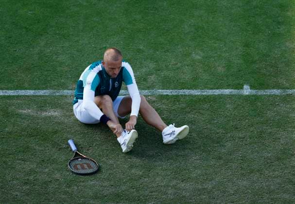 25th June 2025; Devonshire Park, Eastbourne, East Sussex, England; Lexus International Eastbourne, Day 3; Daniel Evans (GBR) slips in the match against Tommy Paul (USA)  ActionPlus12805509 HongboxChen