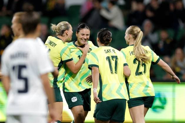 SOCCER AUSTRALIA SLOVENIA, Emily Gielnik of Australia is congratulated by teammates after scoring a goal during the Women s friendly soccer match between Australia and Slovenia at HBF Park in Perth, Thursday, June 26, 2025. ( NO ARCHIVING Perth Western Australia Australia  Copyright: xRichardxWainwrightx 20250626154020134738