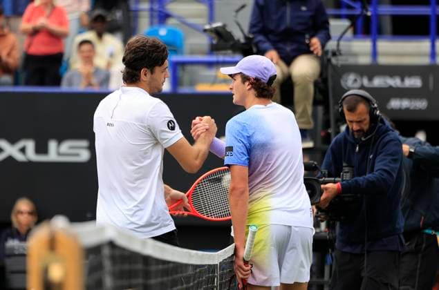 26th June 2025; Devonshire Park, Eastbourne, East Sussex, England; Lexus International Eastbourne, Day 4; Taylor Fritz (USA) shakes hands with Joao Fonseca (BRA) after their match  ActionPlus12805538 HongboxChen