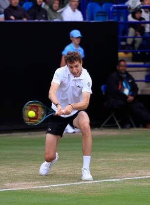 26th June 2025; Devonshire Park, Eastbourne, East Sussex, England; Lexus International Eastbourne, Day 4; Ugo Humbert (FRA) plays a backhand shot against Billy Harris (GBR)  ActionPlus12805520 HongboxChen