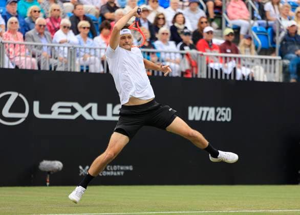 26th June 2025; Devonshire Park, Eastbourne, East Sussex, England; Lexus International Eastbourne, Day 4; Taylor Fritz (USA) plays a backhand shot against Joao Fonseca (BRA)  ActionPlus12805528 HongboxChen