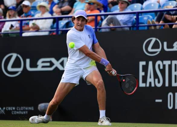 25th June 2025; Devonshire Park, Eastbourne, East Sussex, England; Lexus International Eastbourne, Day 3; Joao Fonseca (BRA) plays a backhand shot against Taylor Fritz (USA)  ActionPlus12805568 HongboxChen