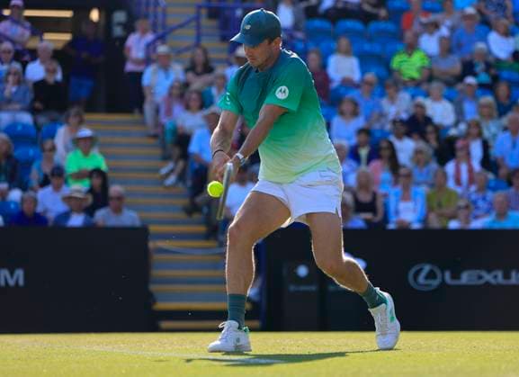 25th June 2025; Devonshire Park, Eastbourne, East Sussex, England; Lexus International Eastbourne, Day 3; Tommy Paul (USA) plays a backhand shot against Daniel Evans (GBR)  ActionPlus12805545 HongboxChen