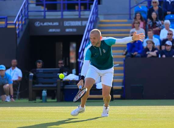 25th June 2025; Devonshire Park, Eastbourne, East Sussex, England; Lexus International Eastbourne, Day 3; Daniel Evans (GBR) plays a backhand shot against Tommy Paul (USA)  ActionPlus12805549 HongboxChen