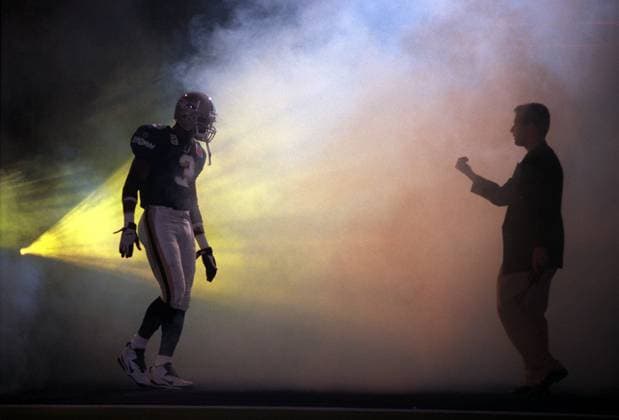 Florida News - September 11, 2005 TP 46768 - - DELIVER TO: SLOT - - 5 10 97 - - tampa - - CAPTION INFO: At the beginning of the game, Johnnie Harris along with his other Storm teammates got introduced with lights, fog, and pyrotechnic Copyright: xStxPetersburgxTimesx