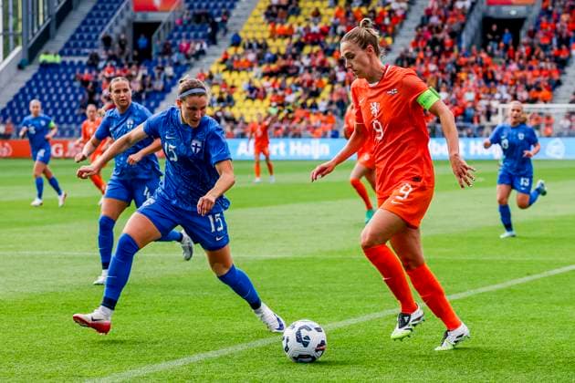 Vivianne Miedema of the Netherlands dribbles with the ball under pressure from Natalia Kuikka of Finland Netherlands v Finland, , Netherlands v Finland, Kooi Stadion, June 26, 2025, Leeuwarden, Netherlands.