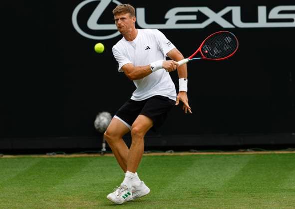 26th June 2025; Devonshire Park, Eastbourne, East Sussex, England; Lexus International Eastbourne, Day 4; Billy Harris (GBR) plays a forehand shot against Ugo Humbert (FRA)  ActionPlus12805704 HongboxChen