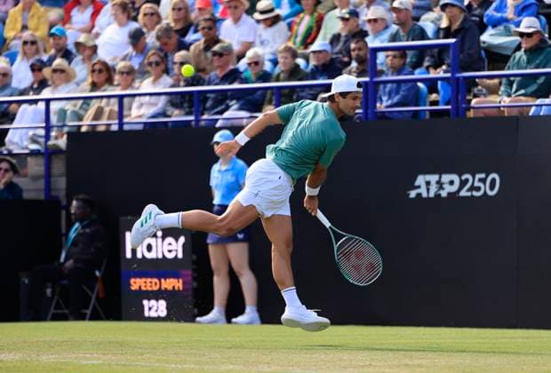 26th June 2025; Devonshire Park, Eastbourne, East Sussex, England; Lexus International Eastbourne, Day 4; Marcos Giron (USA) plays a backhand shot against Taylor Fritz (USA)  ActionPlus12805687 HongboxChen