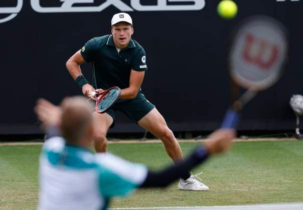 26th June 2025; Devonshire Park, Eastbourne, East Sussex, England; Lexus International Eastbourne, Day 4; Daniel Evans (GBR) plays a forehand shot against Jenson Brooksby (USA)  ActionPlus12805718 HongboxChen