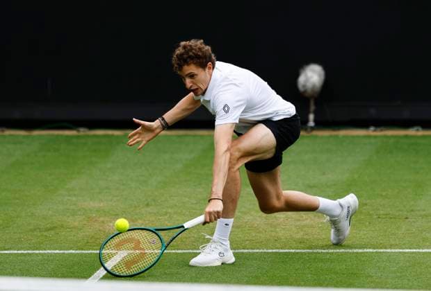 26th June 2025; Devonshire Park, Eastbourne, East Sussex, England; Lexus International Eastbourne, Day 4; Ugo Humbert (FRA) plays a backhand shot against Billy Harris (GBR)  ActionPlus12805697 HongboxChen