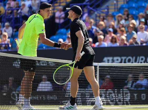 26th June 2025; Devonshire Park, Eastbourne, East Sussex, England; Lexus International Eastbourne, Day 4; Jakub Mensik (CZE) checks Alejandro Davidovich Fokina (ESP) after he fell in the match  ActionPlus12805670 HongboxChen