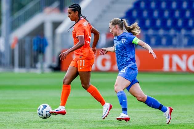 Esmee Brugts of the Netherlands dribbles with the ball under pressure Netherlands v Finland, , Netherlands v Finland, Kooi Stadion, June 26, 2025, Leeuwarden, Netherlands.