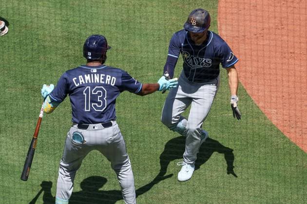 June 26, 2025: Tampa Bay Rays third baseman Junior Caminero (13) and right fielder Josh Lowe (15), right, react to Lowe s solo home run during the sixth inning against the Kansas City Royals at Kauffman Stadium in Kansas City, MO. CSM Kansas City United States of America - ZUMAc04_ 20250626_zma_c04_023 Copyright: xDavidxSmithx