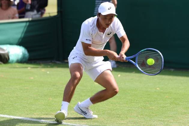 June 26, 2025, London, Celestynow, England: SHINTARO MOCHIZUKI of Japan during the match against D. Stricker of Switzerland in the third round of qualification of Championships 2025 at Wimbledon AELTC in London. London England - ZUMAc278 20250626_zsp_c278_019 Copyright: xMarcinxCholewinskix