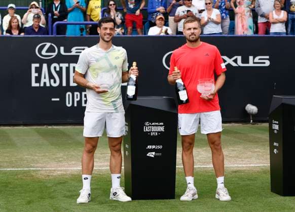 27th June 2025; Devonshire Park, Eastbourne, East Sussex, England; Lexus International Eastbourne, Day 5; Julian Cash (GBR) and Lloyd Glasspool (GBR) with their The Doubles Final trophies  ActionPlus12805880 HongboxChen