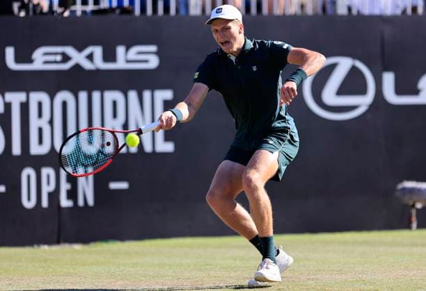 27th June 2025; Devonshire Park, Eastbourne, East Sussex, England; Lexus International Eastbourne, Day 5; Jensen Brooksby (USA) plays a forehand shot against Ugo Humbert (FRA) in the mens semi-finals match  ActionPlus12805994 HongboxChen