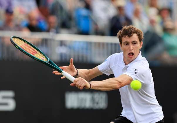 27th June 2025; Devonshire Park, Eastbourne, East Sussex, England; Lexus International Eastbourne, Day 5; Ugo Humbert (FRA) plays a backhand shot against Jensen Brooksby (USA) in the mens semi-finals match  ActionPlus12805999 HongboxChen