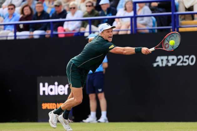 27th June 2025; Devonshire Park, Eastbourne, East Sussex, England; Lexus International Eastbourne, Day 5; Jensen Brooksby (USA) plays a backhand shot against Ugo Humbert (FRA) in the mens semi-finals match  ActionPlus12806004 HongboxChen