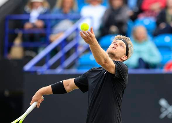 27th June 2025; Devonshire Park, Eastbourne, East Sussex, England; Lexus International Eastbourne, Day 5; Alejandro Davidovich Fokina (ESP) serves to Taylor Fritz (USA) in the mens singles semi-final match  ActionPlus12806108 HongboxChen