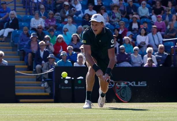 27th June 2025; Devonshire Park, Eastbourne, East Sussex, England; Lexus International Eastbourne, Day 5; Jensen Brooksby (USA) plays a backhand shot against Ugo Humbert (FRA) in the mens singles semi-final match  ActionPlus12806122 HongboxChen