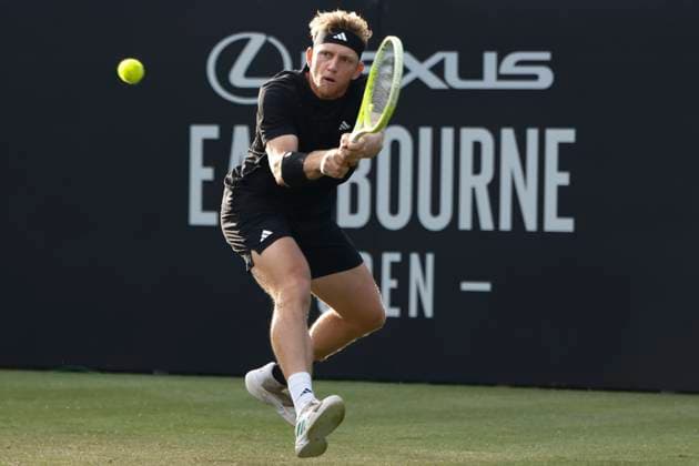 27th June 2025; Devonshire Park, Eastbourne, East Sussex, England; Lexus International Eastbourne, Day 5; Alejandro Davidovich Fokina (ESP) plays a backhand shot gainst Taylor Fritz (USA) in the mens singles semi-final match  ActionPlus12806138 HongboxChen