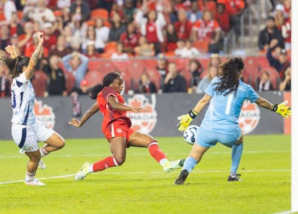 (250628) -- TORONTO, June 28, 2025 -- Annabelle Chukwu (C) of Canada shoots during an international women s friendly match between Canada and Costa Rica in Toronto, Canada, on June 27, 2025. (Photo by Xinhua) (SP)CANADA-TORONTO-FOOTBALL-INTERNATIONAL WOMEN S FRIENDLY MATCH-CANADA VS COSTA RICA ZouxZheng 