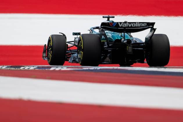 Lance Stroll Aston Martin Aramco F1 Team, Canada, 18 in AMR25 from behind in front of painted flag flag on the asphalt in the finish curve curve 10, AUT, Formula 1 World Championship, MSC Cruises Grand Prix of Austria, Red Bull Ring Spielberg, Qualifying Day, 2025 season, 28 06 2025 AUT, Formula 1 World Championship, MSC Cruises Grand Prix of Austria, Red Bull Ring Spielberg, Qualifying Day, 2025 season, 28 06 2025 Spielberg Copyright: xEibner-Pressefoto Memmlerx EP_MMR