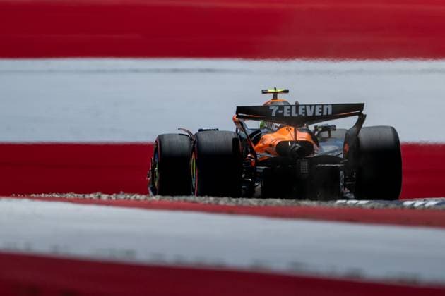 Lando Norris McLaren Formula 1 Team, Great Britain, 04 in MCL39 from behind in front of painted flag flag on the asphalt in the finish curve curve 10, AUT, Formula 1 World Championship, MSC Cruises Grand Prix of Austria, Red Bull Ring Spielberg, Qualifying Day, Season 2025, 28 06 2025 AUT, Formula 1 World Championship, MSC Cruises Grand Prix of Austria, Red Bull Ring Spielberg, Qualifying Day, Season 2025, 28 06 2025 Spielberg Copyright: xEibner-Pressefoto Memmlerx EP_MMR