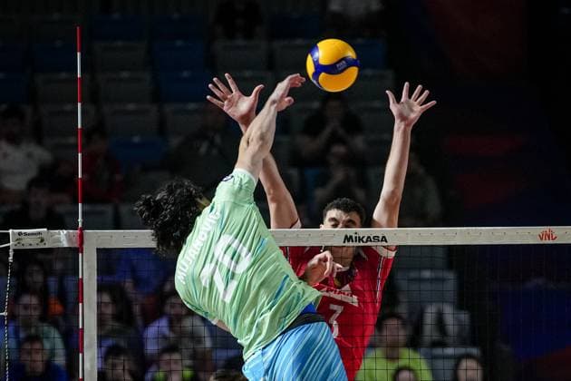 Volleyball - FIVB Men s Volleyball Nations League - Slovenia - France - 28.06.2025 Nik MujanoviÄ‡ spikes against Amir Tizi-Oualou during Mens Volleyball Nations League in Burgas, VNL Copyright: xYulianxTodorovx