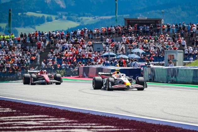 FORMULA 1 - GP of Austria 2025 SPIELBERG,AUSTRIA,28.JUN.25 - MOTORSPORTS, FORMULA 1 - Grand Prix of Austria, Red Bull Ring, practice and qualifying. Image shows Liam Lawson (NZL VCARB) and Charles Leclerc (MON Ferrari).  GEPAxpictures xManuelxBinder
