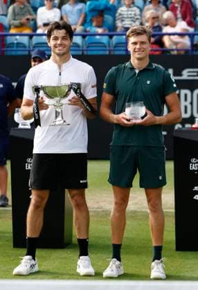 28th June 2025; Devonshire Park, Eastbourne, East Sussex, England; Lexus International Eastbourne, Day 6; Taylor Fritz (USA) with winners trophy and Jensen Brooksby (USA) with runners up trophy after the mens singles final match  ActionPlus12806412 HongboxChen