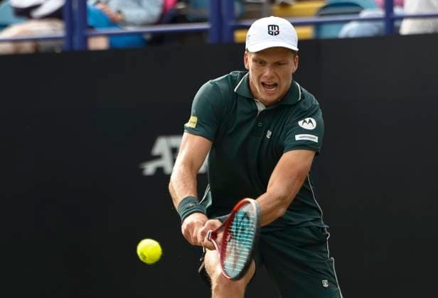 28th June 2025; Devonshire Park, Eastbourne, East Sussex, England; Lexus International Eastbourne, Day 6; Jensen Brooksby (USA) plays a backhand shot against Taylor Fritz (USA) in the mens singles final match  ActionPlus12806439 HongboxChen