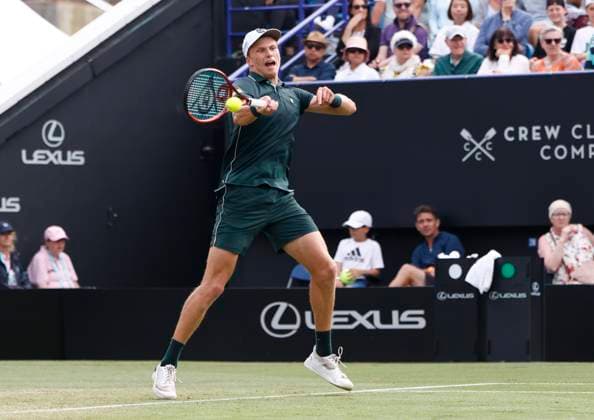 28th June 2025; Devonshire Park, Eastbourne, East Sussex, England; Lexus International Eastbourne, Day 6; Jensen Brooksby (USA) plays a forehand shot against Taylor Fritz (USA) in the mens singles final match  ActionPlus12806433 HongboxChen