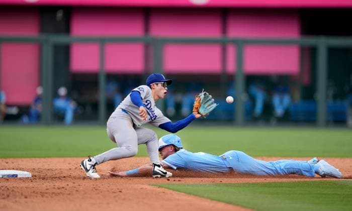 June 28, 2025: Los Angeles Dodgers second base Hyeseong Kim (6) recieves the trow to tag Kansas City Royals outfielder Drew Waters (8) in a steal attempt against the Dodgers at Kauffman Stadium Kansas City, Missouri. CSM. Kansas City United States - ZUMAc04_ 20250628_zma_c04_034 Copyright: xJonxRobichaudx