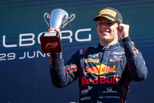 Tim Tramnitz Germany, MP Motorsport, Red Bull Junior celebrates on the podium at the podium ceremony with trophy for 3rd place, AUT, FIA Formula 3 Championship, MSC Cruises Grand Prix of Austria, Red Bull Ring Spielberg, Main race, 2025 season, 29 06 2025 AUT, FIA Formula 3 Championship, MSC Cruises Grand Prix of Austria, Red Bull Ring Spielberg, Main race, 2025 season, 29 06 2025 Spielberg Copyright: xEibner-Pressefoto Memmlerx EP_MMR