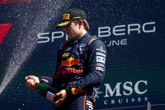 Tim Tramnitz Germany, MP Motorsport, Red Bull Junior celebrates 3rd place on the podium with champagne at the podium ceremony, AUT, FIA Formula 3 Championship, MSC Cruises Grand Prix of Austria, Red Bull Ring Spielberg, Main race, 2025 season, 29 06 2025 AUT, FIA Formula 3 Championship, MSC Cruises Grand Prix of Austria, Red Bull Ring Spielberg, Main race, 2025 season, 29 06 2025 Spielberg Copyright: xEibner-Pressefoto Memmlerx EP_MMR