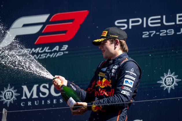 Tim Tramnitz Germany, MP Motorsport, Red Bull Junior celebrates 3rd place on the podium with champagne at the podium ceremony, AUT, FIA Formula 3 Championship, MSC Cruises Grand Prix of Austria, Red Bull Ring Spielberg, Main race, 2025 season, 29 06 2025 AUT, FIA Formula 3 Championship, MSC Cruises Grand Prix of Austria, Red Bull Ring Spielberg, Main race, 2025 season, 29 06 2025 Spielberg Copyright: xEibner-Pressefoto Memmlerx EP_MMR