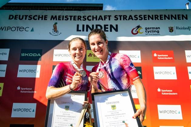 NIEDERMAIER Antonia, KLÖSER Rosa Maria National Championships Road Cycling 2025 RR NIEDERMAIER Antonia GER Second Place KLÖSER Rosa Maria GER Third Place CANYON SRAM ZONDACKYPTO CSZ GER Award Ceremony Medal Ceremony Podium Landscape horizontal Landscape Event Event National Championships Road Cycling Category Category Cycling Road Cycling Elite Women Location Place Europe Germany Rhineland Palatinate Start Linden Finish Linden Rhineland Palatinate Discipline Road Race RR National Championships Distance 118 8 km Date Date 28 06 2025 Saturday