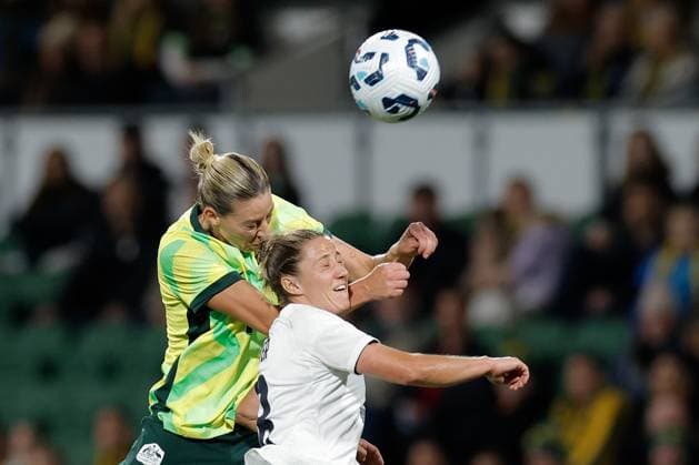 SOCCER AUSTRALIA SLOVENIA, Alanna Kennedy of of Australia and Mateja Zver of Slovenia compete for the ball during the Women s friendly international soccer match between Australia and Slovenia at HBF Park in Perth, Sunday, June 29, 2025. ( NO ARCHIVING, EDITORIAL USE ONLY PERTH WESTERN AUSTRALIA AUSTRALIA  Copyright: xRICHARDxWAINWRIGHTx 20250629122462864620
